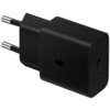 Czarna ładowarka sieciowa z dwoma metalowymi bolcami i portem USB Typ-C. Na obudowie widoczny jest symbol błyskawicy oraz napis "Fast Charging".
