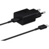 Czarna ładowarka sieciowa z dwoma bolcami oraz kablem USB Typ-C. Na obudowie ładowarki widoczny jest symbol błyskawicy i napis "Fast Charging".