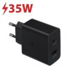 Czarna ładowarka sieciowa z dwoma portami, oznaczonymi jako "Max 35W" i "Max 15W", z widocznym napisem "Super Fast Charging". Obok ładowarki znajduje się czerwony symbol błyskawicy z tekstem "35W".