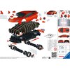 Na zdjęciu znajduje się zestaw do składania puzzli 3D przedstawiający czerwony samochód sportowy, z widocznymi elementami do montażu, takimi jak karoseria, podwozie i koła. Po prawej stronie znajdują się instrukcje, ostrzeżenia w różnych językach, ilustra