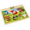 Puzzle przedstawiające kolorowe, kreskówkowe zwierzęta leśne, takie jak sowa, lis, niedźwiedź, wiewiórka, szop pracz i królik, ułożone na tle zielonej łąki z kwiatami i grzybem. Na ramce puzzli znajduje się mały obrazek z tym samym motywem.