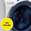 Obraz przedstawia fragment pralki z widocznym bębnem i panelem z oznaczeniami: "7kg 1400 obr/min", "Speed-Drive Inverter" oraz "Quick&Clean". Na żółtym tle znajduje się napis "1400 OBR./MIN.".
