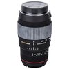Obiektyw fotograficzny z widocznymi oznaczeniami "Sigma APO DC" oraz "70-300mm 1:4-5.6" na czarnej obudowie. Na dekielku znajduje się napis "S/N KPR".