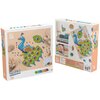 Na zdjęciu widoczne są dwa pudełka puzzli "PLUS-PLUS Puzzle by Number" z motywem pawia, każde zawierające 800 elementów. Na opakowaniach znajdują się ilustracje przedstawiające kolorowego pawia złożonego z puzzli oraz logo "PLUS PLUS".