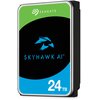 Na zdjęciu widoczny jest dysk twardy z logo "SEAGATE" na zielonym tle, poniżej znajduje się czarny obszar z niebieskim logo ptaka i napisem "SKYHAWK AI". Na dole, na niebieskim tle, widnieje napis "24TB".