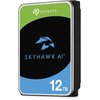 Na zdjęciu znajduje się dysk twardy z etykietą w kolorach zielonym, czarnym i niebieskim, z logo "SEAGATE" na górze oraz napisem "SKYHAWK AI" i oznaczeniem pojemności "12 TB" na dole.