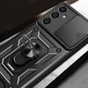 Czarne etui TECH-PROTECT CamShield Pro do Samsung Galaxy A05S z widocznym wzorem geometrycznym i uchwytem na palec. Obok znajduje się osłona na aparat z trzema otworami na obiektywy i lampą błyskową.