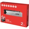 Czerwone opakowanie z ilustracją dysku SSD i postacią animowaną, z widocznymi napisami: "XPG GAMMIX S60 PCIe Gen4 x4 M.2 2280 SSD" oraz "2 TB". Na opakowaniu znajdują się także ikony z napisami: "Work with PS5", "PCIe 4.0", "3D NAND", "NVMe 1.4", "SLC Cac