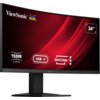 Monitor ViewSonic z zakrzywionym ekranem o przekątnej 34 cale, wyświetla na ekranie informacje: "1500R Curved", "USB-C", "Docking". W lewym górnym rogu widoczne jest logo ViewSonic z trzema kolorowymi ptakami.