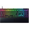 Na zdjęciu znajduje się klawiatura z podświetleniem RGB, z widocznymi klawiszami numerycznymi, funkcyjnymi oraz standardowymi literowymi. Na dolnej części klawiatury widoczne jest logo producenta.