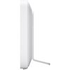 Biały, prostokątny router z widocznym bocznym profilem i cienką, pionową podstawą. Produkt ma gładką powierzchnię i minimalistyczny design.