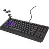 Czarna klawiatura mechaniczna z podświetleniem RGB, z widocznymi klawiszami i przełącznikami Outemu Brown. Na obudowie znajduje się logo "GENESIS".