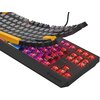 Klawiatura mechaniczna z podświetleniem RGB, z widocznymi czerwonymi przełącznikami i uniesionymi klawiszami, ukazującymi wnętrze urządzenia. Na obudowie znajduje się logo "GENESIS".