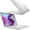 Na zdjęciu widoczny jest srebrny laptop z cienkimi ramkami ekranu, na którym wyświetlany jest kolorowy, abstrakcyjny obraz. Na obudowie laptopa znajduje się logo producenta.