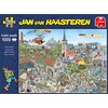 Kolorowa ilustracja przedstawia zatłoczoną scenę z wieloma postaciami i budynkami, w tym kościołem i domami, z napisem "JAN van HAASTEREN" u góry oraz logo "Jumbo" w prawym górnym rogu. Po lewej stronie widnieje tekst "Comic puzzle 1000" oraz "Island Retr