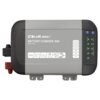 Prostokątna ładowarka z logo "Qoltec" i napisem "BATTERY CHARGER 30A Model: 51955" na szarej obudowie, z ikonami i wskaźnikami LED po prawej stronie. Widoczne są oznaczenia: "LiFePo4", "Flooded", "Calcium", "AGM", "SLA", "GEL", oraz "30A", "12-15 DC", "3-STAGE CHARGING", "BUILT-IN FAN".