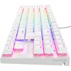 Biała klawiatura mechaniczna z podświetleniem RGB, na której widoczne są klawisze z oznaczeniami liter i funkcji, a na obudowie znajduje się logo "GENESIS" oraz napis "THOR 303 TKL". Klawisze mają różnokolorowe podświetlenie, a na zdjęciu widoczny jest ta