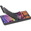 Czarna klawiatura mechaniczna z podświetleniem RGB, z unoszącymi się klawiszami, ukazująca kolorowe przełączniki. Na obudowie widoczne jest logo "GENESIS".