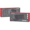 Czerwone opakowanie klawiatury mechanicznej z napisem "GENESIS THOR 230 TKL Wireless" oraz grafiką klawiatury z podświetleniem RGB. Na opakowaniu znajdują się także ikony przedstawiające funkcje produktu, takie jak "Hot Swappable", "Mechanical Keyboard", 