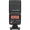 Czarna lampa błyskowa z wyświetlaczem LCD, na którym widnieją ustawienia: "M", "1/8", "+0.3", "Au", "mm", "zoom". Poniżej znajdują się przyciski z oznaczeniami: "MODE", "ZOOM", "SYNC", "SLAVE", oraz pokrętło z napisem "SET".