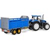 Zabawka przedstawia niebieski traktor z przyczepą do transportu inwentarza, z żółtymi kołami i szarymi elementami. Na przyczepie widoczny jest napis "DairyFarm".
