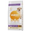 Na zdjęciu znajduje się opakowanie karmy dla psa z napisem "IAMS for Vitality" oraz wizerunkiem szczeniaka. Na opakowaniu widnieje informacja "Puppy 1-12" oraz "3 kg", a także ikony przedstawiające korzyści zdrowotne.