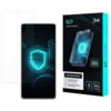 Na zdjęciu znajduje się telefon z nałożoną folią ochronną, obok którego widoczna jest opakowanie produktu. Na opakowaniu widnieje napis "1UP screen protector", logo "3mk", oraz informacje: "Transparentna folia ochronna", "Bezpieczny montaż na mokro", "3 P