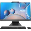 Na zdjęciu znajduje się komputer stacjonarny typu all-in-one z dużym ekranem, na którym widoczne są kolorowe bańki na niebieskim tle oraz logo "ASUS". Przed komputerem umieszczono czarną klawiaturę i myszkę.