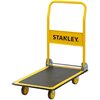 Żółty wózek transportowy z czarną platformą i czterema kołami, z widocznym logo "STANLEY" na uchwycie. Wózek ma solidną konstrukcję i jest przeznaczony do przewożenia ładunków do 150 kg.