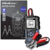 Tester akumulatorów Qoltec 52487 jest przedstawiony obok opakowania, na którym widnieje jego ilustracja oraz napisy: "Qoltec", "Battery Tester", "12V/24V", "Multiple Detection", "Multiple Protection", "Status of Charge", "Model: 52487". Tester posiada wyś