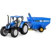 Na zdjęciu znajduje się niebieski model traktora z przyczepą przeładowczą, na której widnieje napis "Farmer BH" oraz "G-400". Traktor ma duże czarne opony i szczegółowo odwzorowaną kabinę.