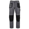 Szare spodnie robocze z czarnymi wzmocnieniami na kolanach i kieszeniach, posiadające kilka kieszeni, w tym jedną z klapką. Produkt to "Spodnie robocze STALCO Winter Basic Line S-51764" w rozmiarze L.