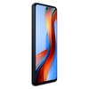 Smartfon w kolorze ciemnogranatowym z dużym wyświetlaczem o przekątnej 6.78 cala, prezentuje dynamiczną grafikę w odcieniach niebieskiego, pomarańczowego i czerwonego. Urządzenie obsługuje technologię 5G, posiada 8 GB RAM i 256 GB pamięci wewnętrznej oraz
