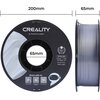 Czarna szpula filamentu z napisem "CREALITY 3D PRINTER FILAMENT" oraz "CR-PLA SILK" z informacjami: "Diameter: 1.75MM, Net weight: 1KG, Extruder Temp: 190°C-230°C". Na dole znajdują się trzy kody QR z podpisami: "Creality Facebook", "Creality Ecosystem" i