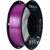 Zdjęcie przedstawia szpulę różowo-fioletowego filamentu do drukarki 3D, umieszczoną na czarnej podstawie z napisem "CREALITY 3D PRINTER FILAMENT". Na etykiecie widnieje tekst: "CR-PLA SILK, Diameter: 1.75MM, Net Weight: 1KG, Extruder Temp: 190°C-230°C", a