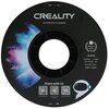 Czarna szpula filamentu z napisem "CREALITY 3D PRINTER FILAMENT" oraz kolorowym wzorem przypominającym galaktykę. Na szpuli znajdują się informacje: "CR-PETG", "Diameter: 1.75MM", "Net weight: 1KG", "Extruder Temp: 230°C-250°C", a także ikony z kodami QR 