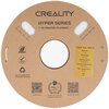 Okrągła szpula z tektury z napisem "CREALITY HYPER SERIES 3D PRINTER FILAMENT" zawiera biały filament widoczny przez dwa otwory. Na żółtej etykiecie znajdują się informacje: "Hyper PLA WHITE, Diameter 1.75mm, Net Weight 1kg/2.2lb, Printing Speed 30-60mm/s