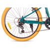 Zdjęcie przedstawia tylne koło roweru z żółtą oponą i zieloną ramą, z widocznym mechanizmem przerzutek oraz łańcuchem. Na szprychach znajduje się żółty odblask, a na przerzutce widoczny jest napis "Shimano".