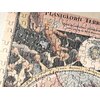 Fragment ułożonych puzzli przedstawiający część mapy z ilustracją aniołków i tekstem "PLANIGLOBI TERR...". Widoczne są także fragmenty napisów: "Quam ex novissimis probatissimisque", "ZONA FRIGIDA SEPTENTRIONALIS" oraz inne detale graficzne mapy.