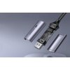 Na zdjęciu widoczny jest rozłożony na części kabel USB-C - DisplayPort w kolorze czarno-srebrnym, z widocznym wnętrzem z elementami elektronicznymi. Na obudowie znajduje się napis "UGREEN 8K".