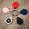 Etui FIXED Silky do Apple AirTag 4szt. (2x Czarny + 2x Biały) Kolor Biały