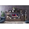W elegancko urządzonym salonie znajduje się telewizor Hyundai HLA32339 32'' LED Android TV, umieszczony na drewnianej szafce, z widocznym na ekranie logo "HYUNDAI", "androidtv" oraz "DOLBY AUDIO". Wokół telewizora znajdują się dekoracje, takie jak rośliny
