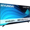 Telewizor marki HYUNDAI z ekranem o przekątnej 65 cali, wyświetlający grafikę w odcieniach niebieskiego, z widocznymi napisami: "UHD 65"", "android tv", "Dolby Atmos". Na dolnej ramce telewizora znajduje się logo producenta.