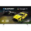 Na zdjęciu widoczny jest telewizor z logo "BLAUPUNKT" oraz "Google TV", a na ekranie wyświetlane są dwa samochody wyścigowe z napisami "IRON LYNX MOTORSPORT LAB". Na dole ekranu znajdują się napisy "4K", "LED", "UGC5500 Series", oraz "65"".