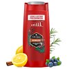 Czerwony żel pod prysznic z napisem "Old Spice Bearglove" oraz "LONG LASTING FRESHNESS" na etykiecie, otoczony ilustracjami cytryny, jagód, cynamonu i gałązki rozmarynu. Na opakowaniu widnieje również napis "PERFUME QUALITY SCENT".