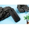 Czarny telefon komórkowy leży na niebieskim tle, otoczony przez czarne, teksturowane skały i małą plastikową palmę. Na obudowie telefonu widoczny jest pomarańczowy napis "ULEFONE".