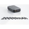 Szary powerbank z dwoma portami USB i logo "AUKEY" na górze, obok którego widnieje napis "20000mAh". Produkt jest przedstawiony na białym tle.
