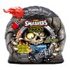 Opakowanie zestawu kreatywnego ZURU Smashers Monster Trucks z grafiką czaszki i płomieni oraz niebieskim monster truckiem. Na opakowaniu widnieje tekst: "ZURU Smashers Monster Trucks", "Over 25 Monster Truck Surprise!", "Build, Race, Crash & Smash!", "War