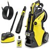 Na zdjęciu znajduje się myjka ciśnieniowa w kolorze żółto-czarnym z napisem "KARCHER K7 Premium Smart Control" oraz akcesoria: wąż, lanca, szczotka do czyszczenia i butelka z płynem "Stone & Facade Cleaner".