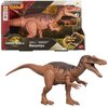 Pudełko z figurką dinozaura Baryonyx z serii Jurassic World, z widocznym logo Jurassic World i napisem "Baryonyx". Figurka jest brązowa z ciemniejszymi akcentami na grzbiecie, a na opakowaniu znajduje się również logo Mattel.